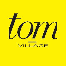 tom village